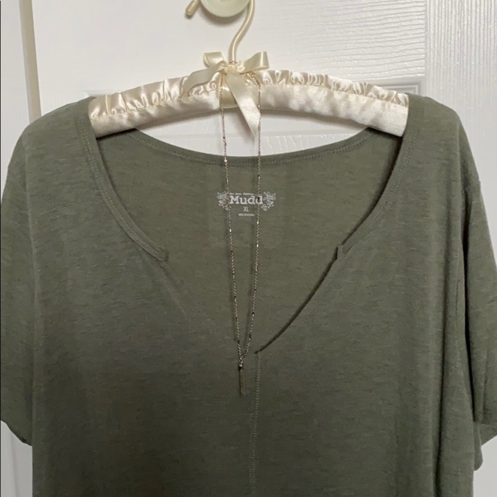 Green t-shirt runs true to size.